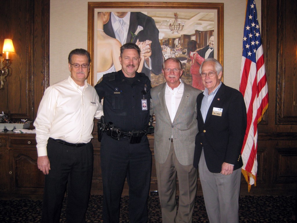 Jeff Strickland (Geer Services), Wally Butler (JSO), Sheriff John Rutherford (JSO) and Pat Geer (Geer Services).